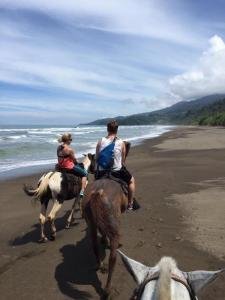 Horseback riding to Hermosa Beach, South Pacific, Costa Rica